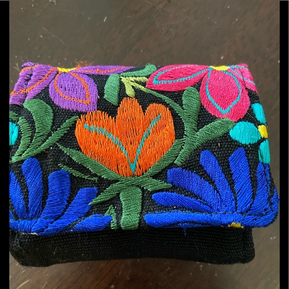 Bamboo Trading Company fold up case with 5 individual zippered compartments. - Picture 1 of 3